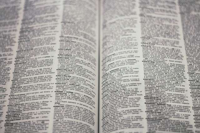 Two pages in a dictionary, symbolic of our list of common accounting terms.